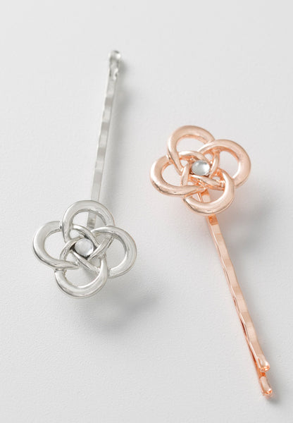Silver tone and imitation rose gold celtic style bobby pins.