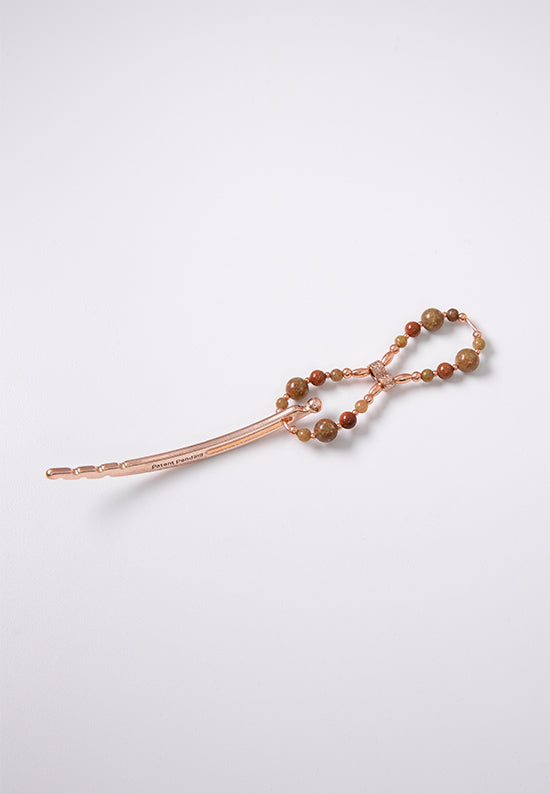 Flexi flip hair clip with metallic goldstone, autumn Jasper and imitation Rose Gold beads.