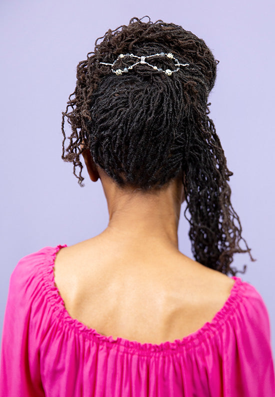 In hair flexi flip hair clip using Blue Labradorite, Dalmatian Jasper, and imitation rhodium beads.