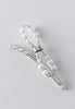 Flexi flip hair clip with glass pearls and imitation rhodium beads.