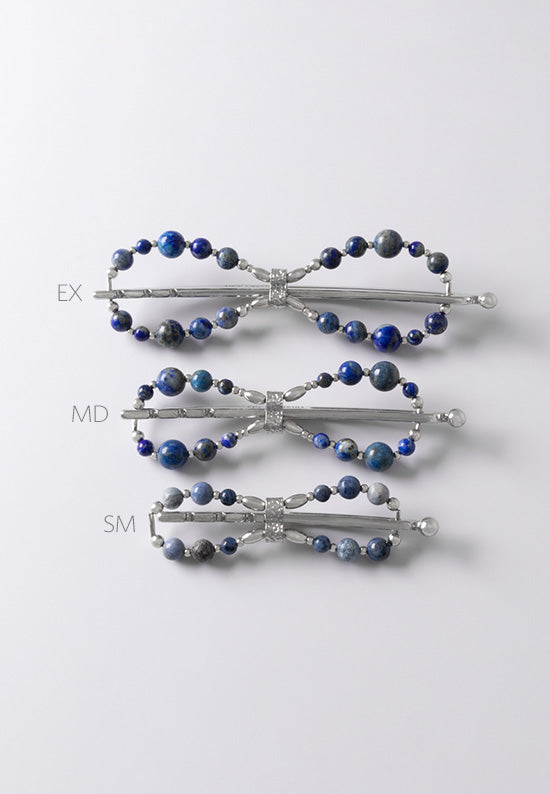 Flexi flip hair clip with denim lapis and imitation rhodium beads in three sizes.