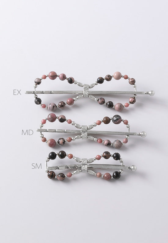 Flexi flip hair clip made with rhodonite, a dusty rose pink with black matrix blend and imitation rhodium beads in three sizes.