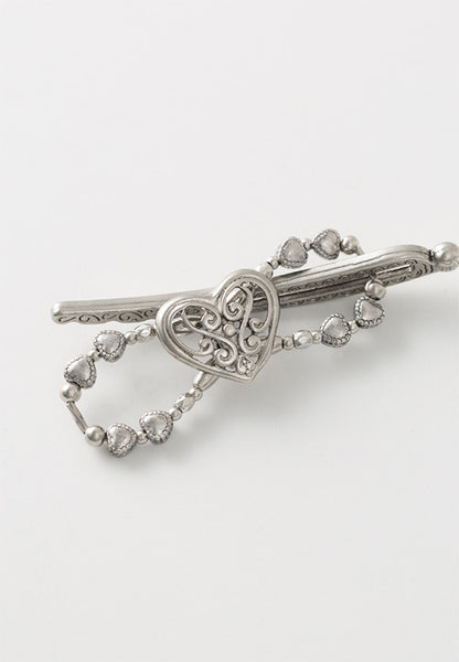 Ornate heart flexi hair clip.
