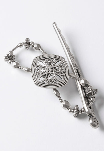 Diamond shaped celtic filigree flexi hair clip in silvertone.