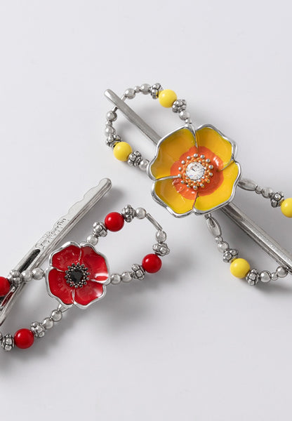 Red and yellow bright poppy flower flexi hair clip.