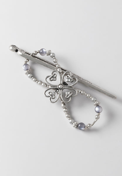 Ornate clover flexi hair clip.
