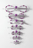 All 7 sizes, from XXL thru XXS, of the purple tulip flexi hair clip.