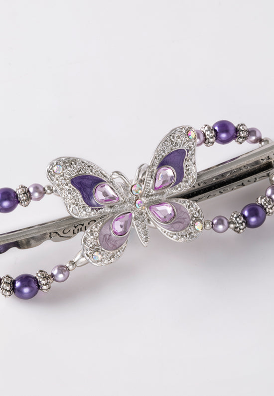Beautiful butterfly with delicately detailed wings and lavender and purple pearls.