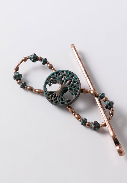 Genesis Flexi Clip features the tree of life with coppertone and patina accents.