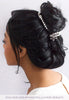 Hair pin and band combination in bun.