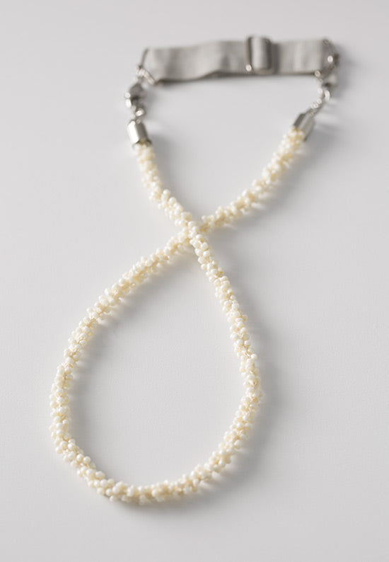 Elegant cluster of ivory pearl seeds.