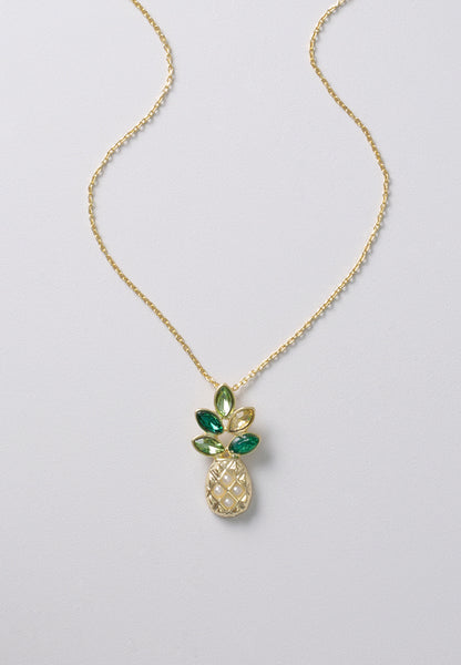Pineapple necklace with green and golden crystal leaves and white pearl accents. 