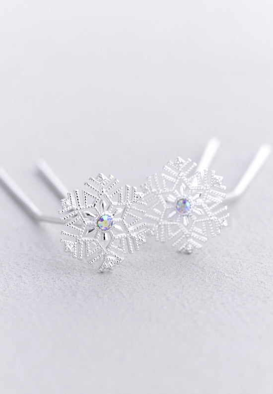 Snowflake hair pin with aurora borealis stoneset.