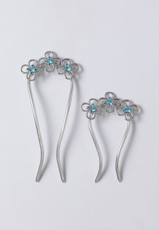 Decorative turquoise stone set swerve hair pins.