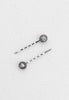 Bobby pin adorned with a lovely circle set with aurora borealis stone.