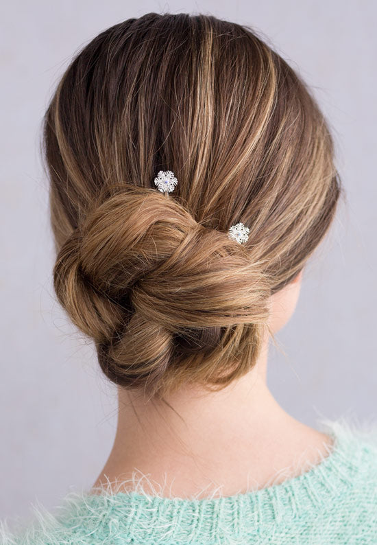 crystal aurora borealis stone in center of snowflake in silvertone