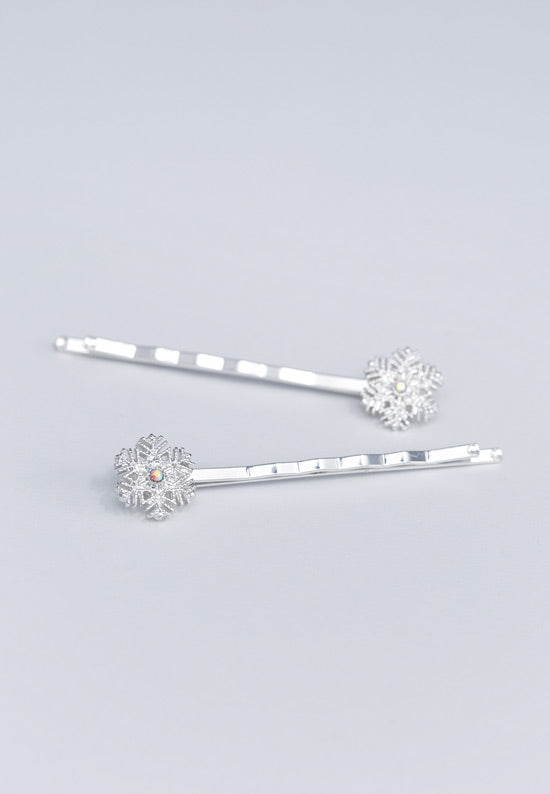 crystal aurora borealis stone in center of snowflake in silvertone