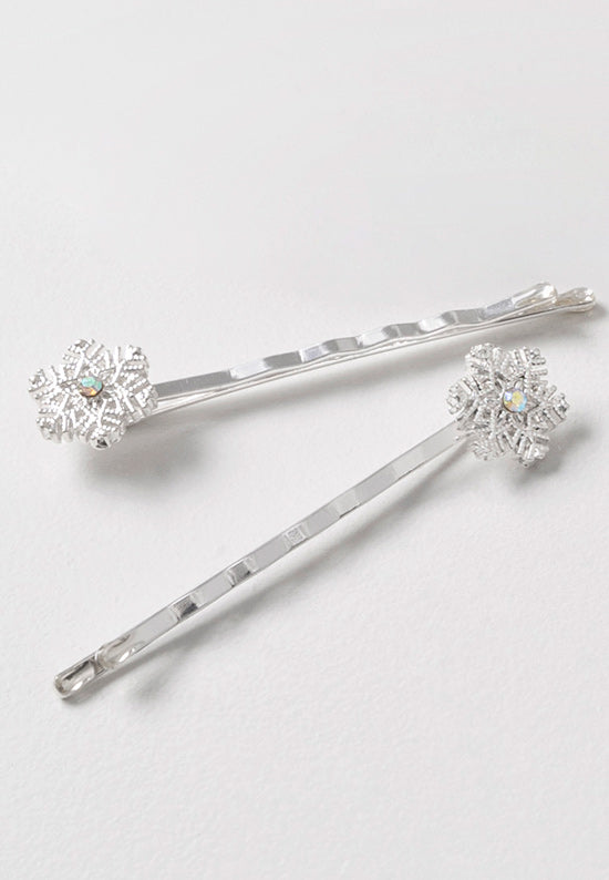 crystal aurora borealis stone in center of snowflake in silvertone