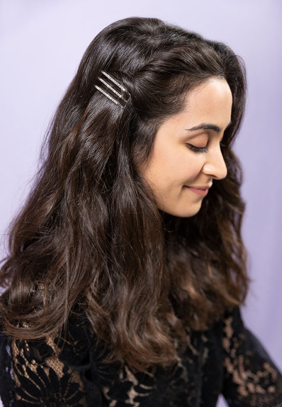 Band of rhinestones set in silvertone bobby pin