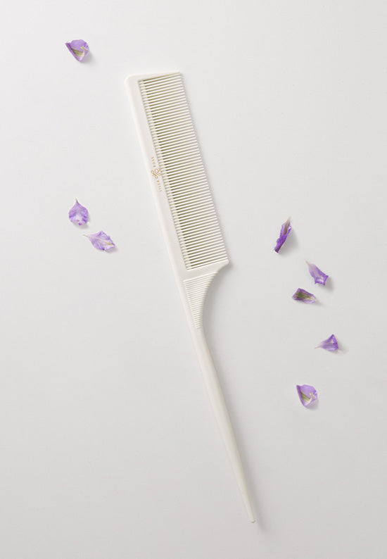 White comb with the Lilla Rose logo.