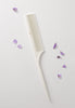 White comb with the Lilla Rose logo.