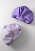 Shower Cap comes in your choice of two beautiful shades of purple with polka dots