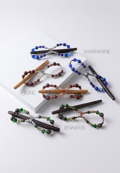 Unique carved wood pin and three coordinating bead designs.