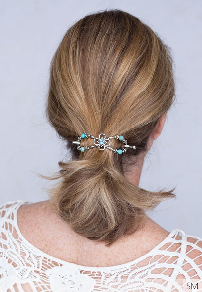 Cool and peaceful colors of turquoise with this timeless Flexi Clip in blonde hair