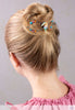 Flexi hair clip with toucan and fun, bright colors and beads.
