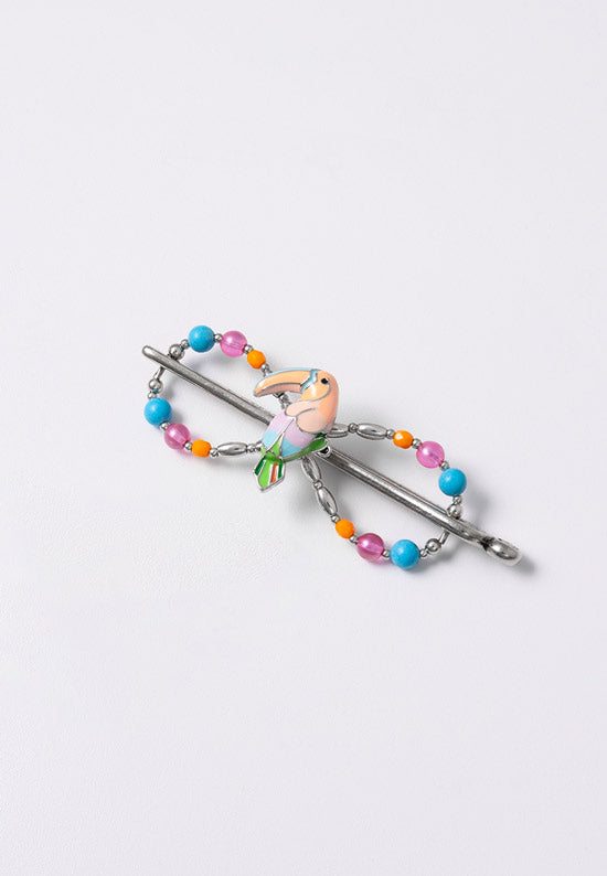 Flexi hair clip with toucan and fun, bright colors and beads.