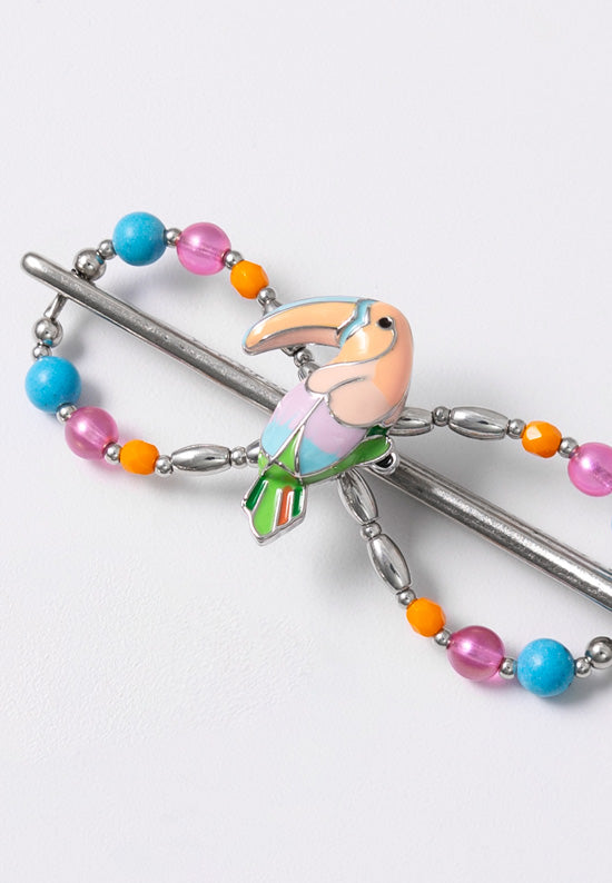Flexi hair clip with toucan and fun, bright colors and beads.