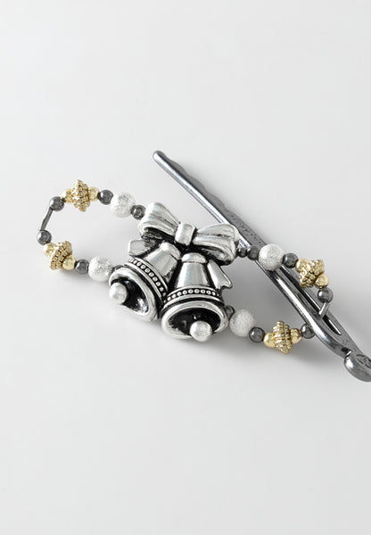 Flexi Hair Clip with pair of festive silver bells with mixed metal accents.