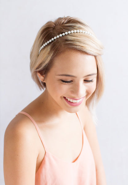 Beaded pearl hair band.