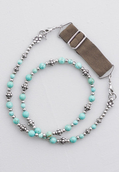 Beaded turquoise hairband.
