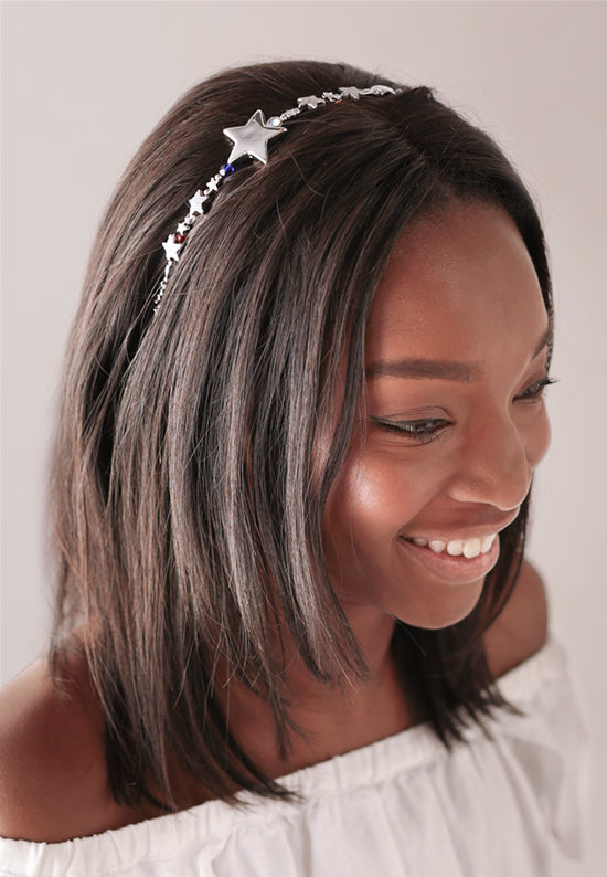 Patriotic Stars hairband shown in hair with sparkling red, blue and clear crystal accents.
