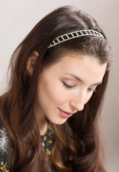 A beautifully patterned hairband with sparkling crystals.
