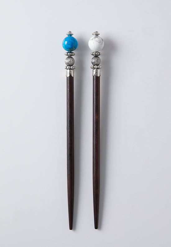 Tabitha hair sticks with marbled turquoise and white howlite stones.
